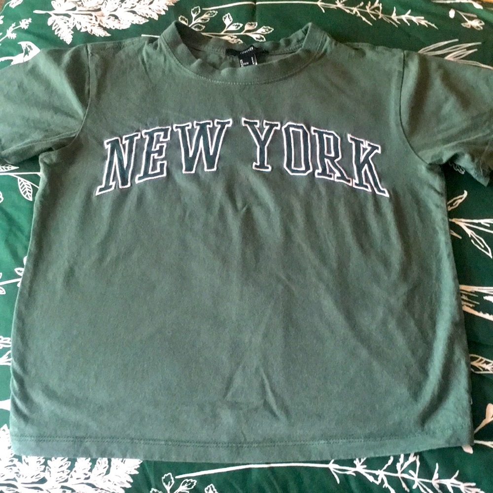 Dark green shirt with New York highlighted in white